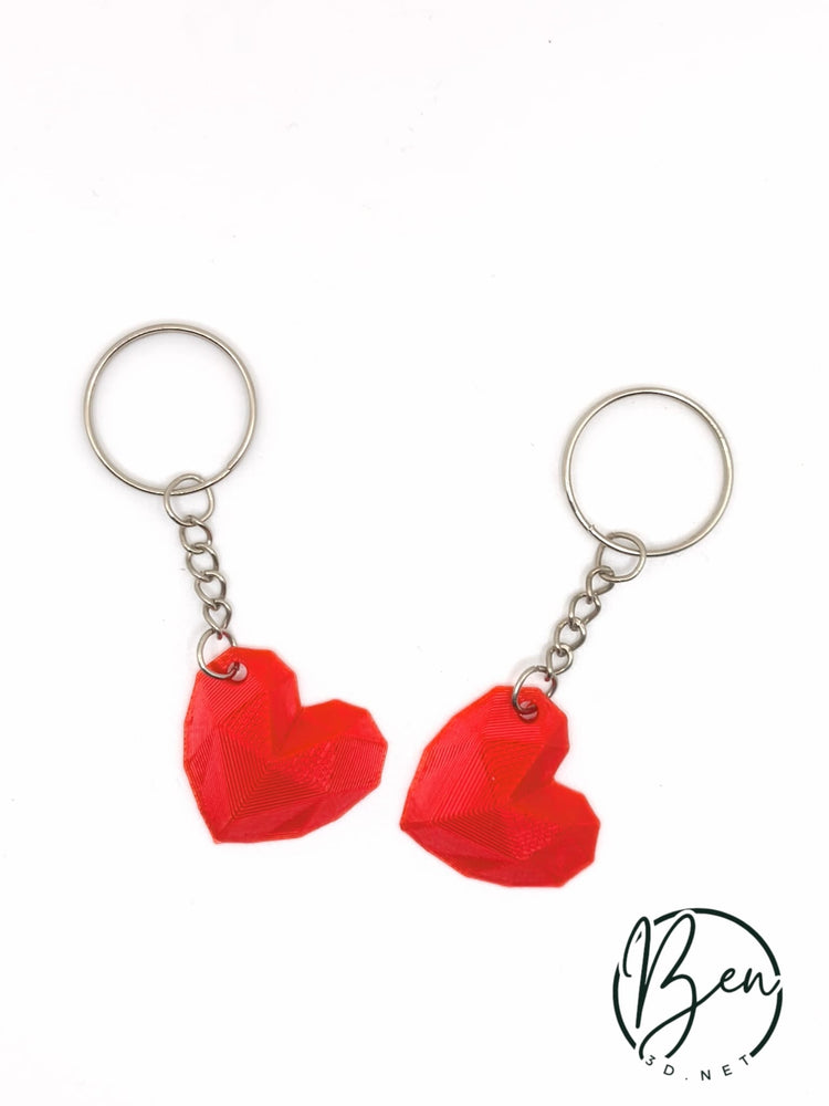 Llavero en forma de corazón pixelado impreso en 3D
